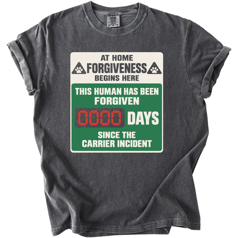 Dark gray t-shirt with a sign reading "At Home Forgiveness Begins Here," "This Human Has Been Forgiven," and "0000 Days Since The Carrier Incident."