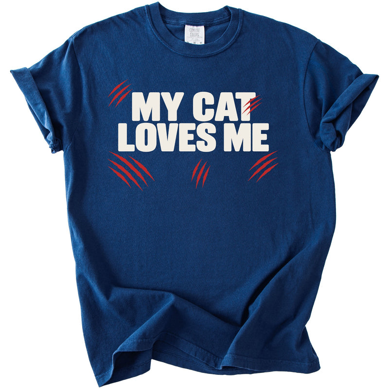 Navy blue t-shirt with white text "MY CAT LOVES ME" and red claw marks.