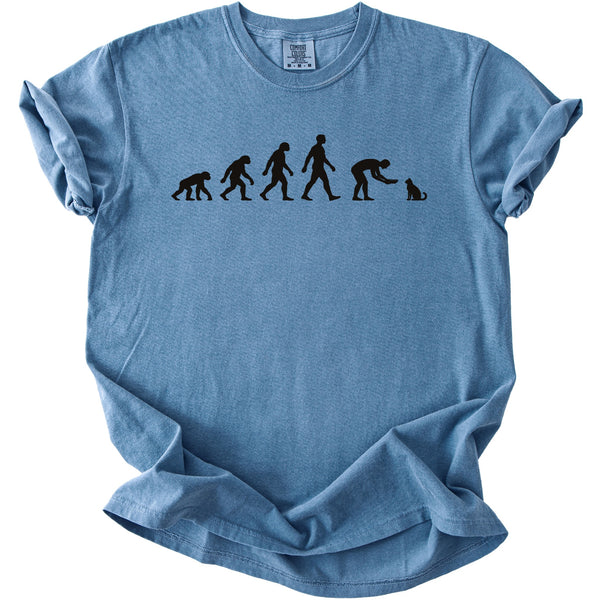 Evolution graphic on blue t-shirt showing human progression towards a cat.