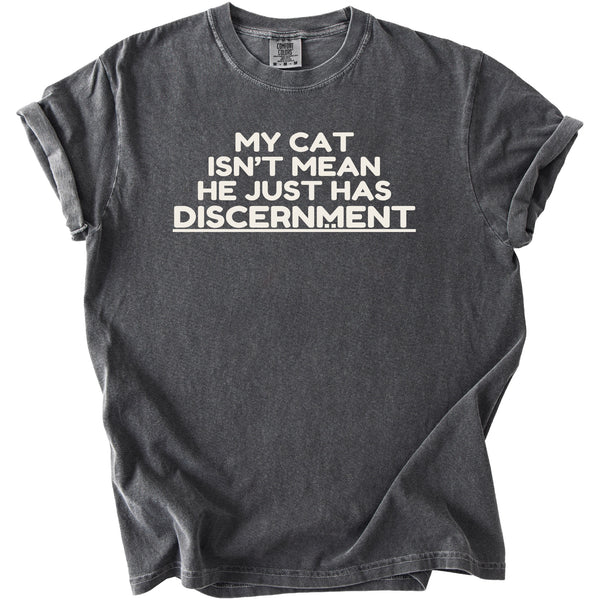 Dark grey t-shirt with white text: MY CAT ISN'T MEAN HE JUST HAS DISCERNMENT
