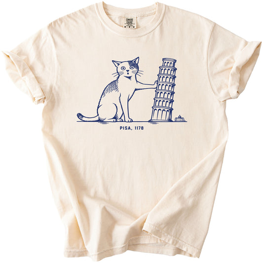 Cream t-shirt with navy line drawing of a cat holding the Leaning Tower of Pisa.