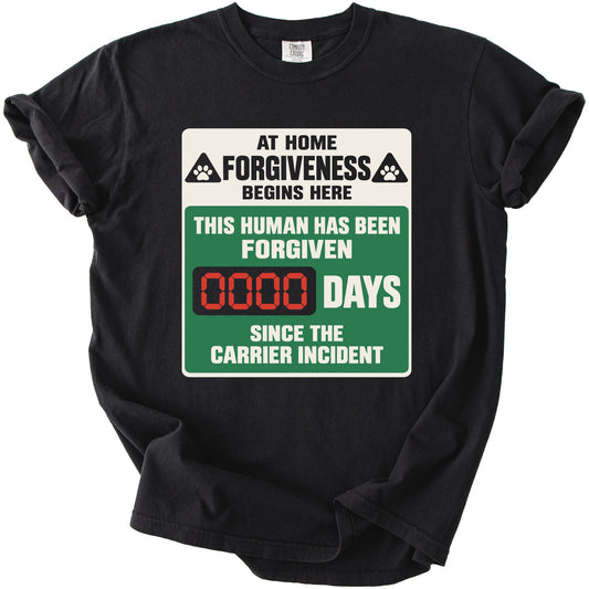 Black t-shirt with a sign graphic reading "At Home Forgiveness Begins Here. This Human Has Been Forgiven 0000 Days Since The Carrier Incident."