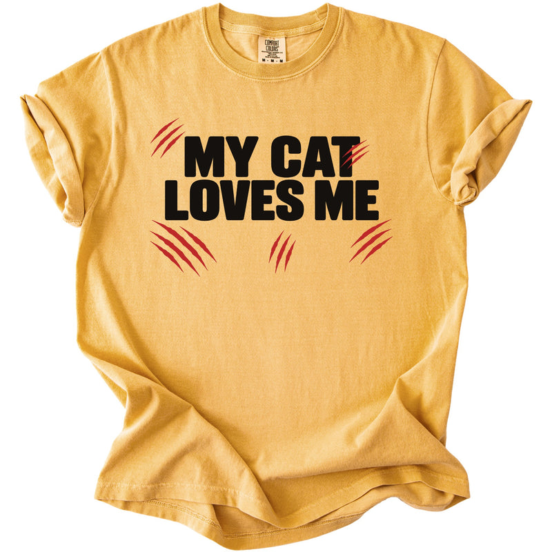Yellow t-shirt with black text "MY CAT LOVES ME" and red claw marks.