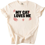 Cream t-shirt with black text "MY CAT LOVES ME" and red claw marks.
