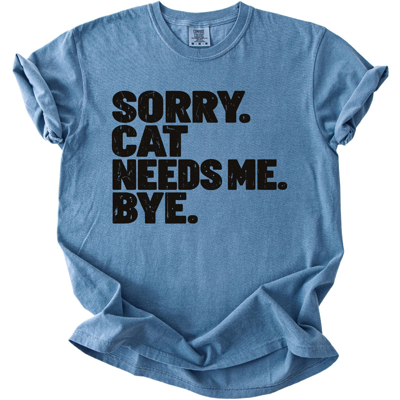 Blue t-shirt with black text that says "SORRY. CAT NEEDS ME. BYE."