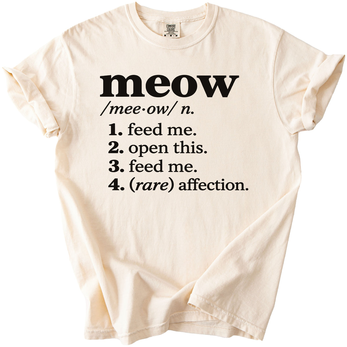 Cream t-shirt with "meow" definition in black text.