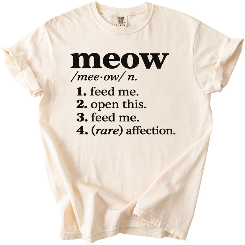 Cream t-shirt with "meow" definition in black text.