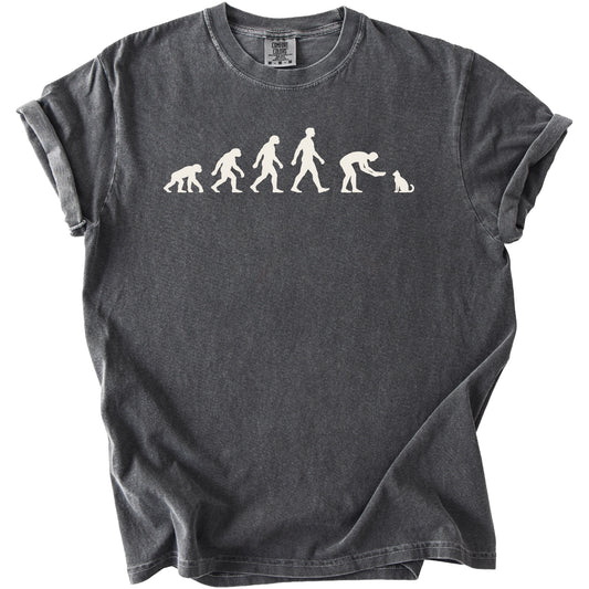 Dark grey t-shirt with white graphic showing evolution from ape to human interacting with cat.