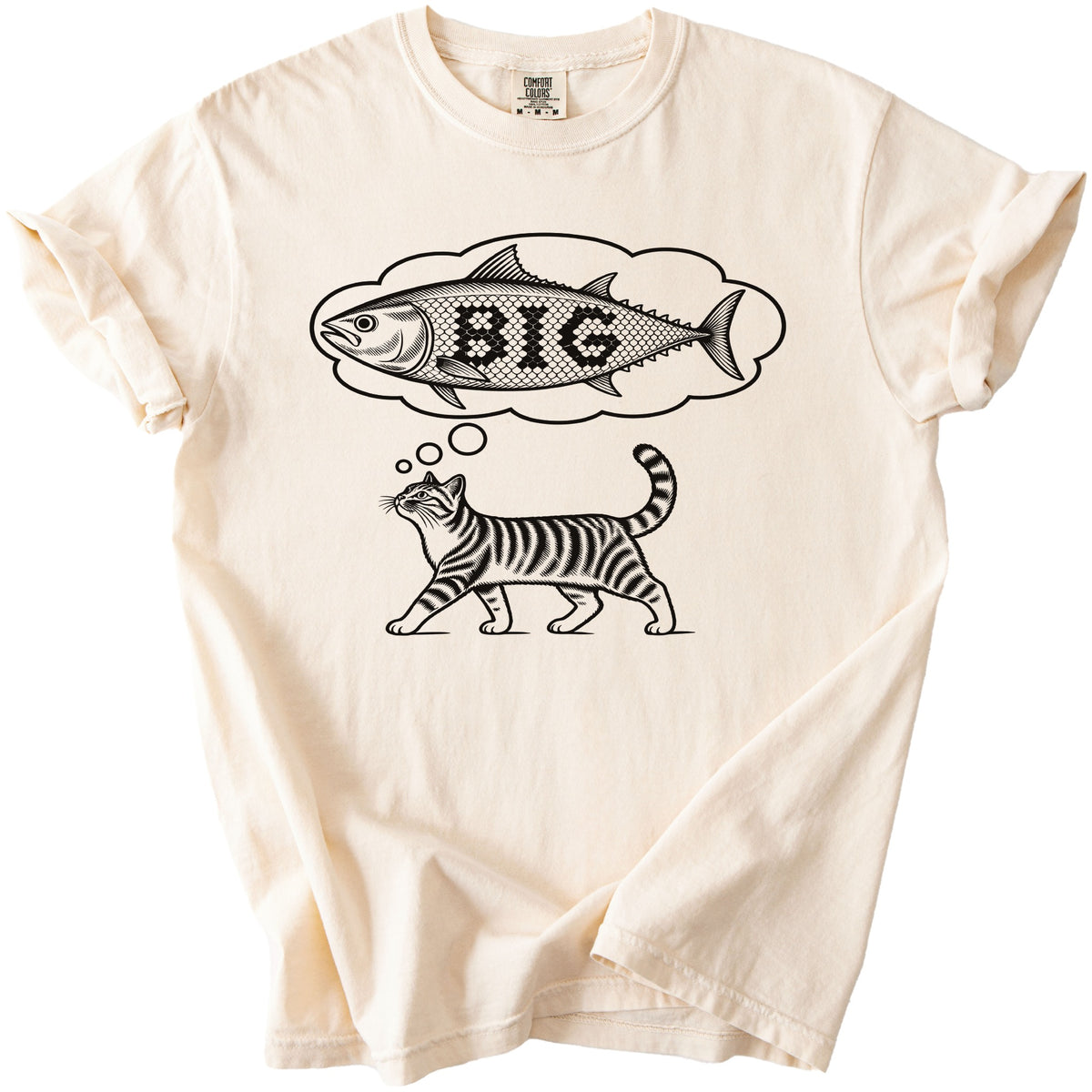 Cream t-shirt with black graphic of a cat dreaming of a fish with the word "BIG"
