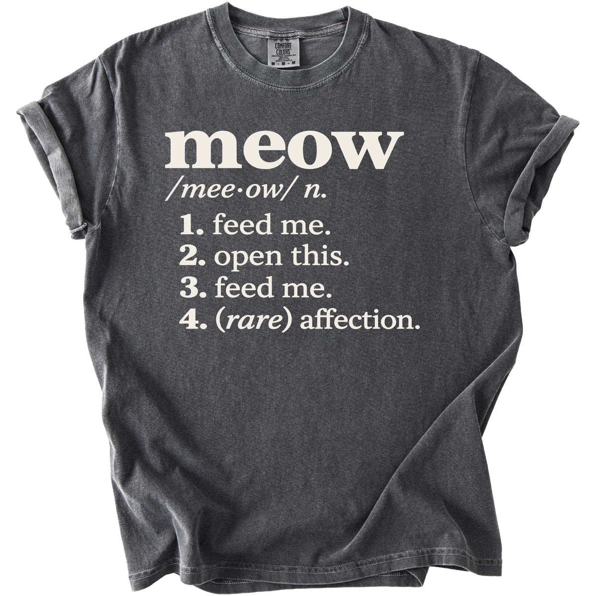 Dark grey t-shirt with "meow" definition: 1. feed me. 2. open this. 3. feed me. 4. (rare) affection.