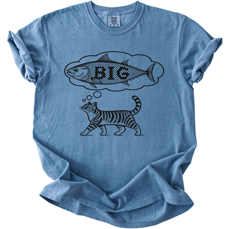 Blue t-shirt with a graphic of a cat dreaming of a fish with the word "BIG".
