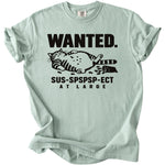 Light green t-shirt with "WANTED. SUS-SPSPSP-ECT AT LARGE" and a cat graphic.
