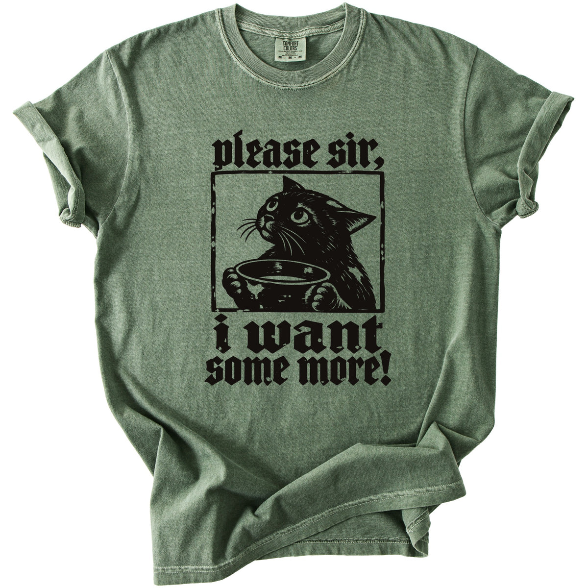 Green t-shirt with black graphic of a cat holding a bowl and text "please sir, i want some more!".