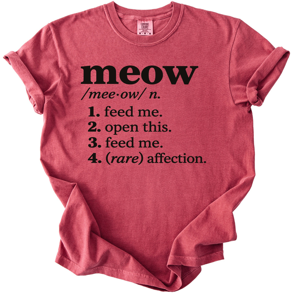 Red t-shirt with "meow" definition: feed me, open this, feed me, rare affection.