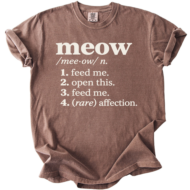 Brown t-shirt with "meow" definition printed in white text.