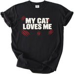 Black t-shirt with "MY CAT LOVES ME" in white text and red claw marks.