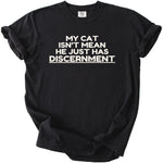 Black t-shirt with white text that reads "MY CAT ISN'T MEAN HE JUST HAS DISCERNMENT".