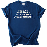 Blue t-shirt with white text: "MY CAT ISN'T MEAN HE JUST HAS DISCERNMENT"